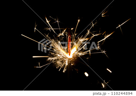 Vibrant Sparkler Display in Dark Background 110244894