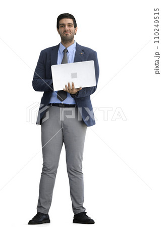 A man in an office suit with a laptop in his hand on a White background A man in an office suit with a laptop in his hand on a White background 110249515