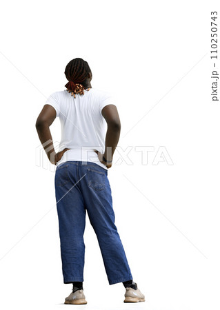 A man in a white T-shirt on a White background, his back hurts, back view A man in a white T-shirt on a White background, his back hurts, back view 110250743