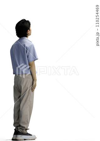 A guy in a blue shirt, on a white background, in full height A guy in a blue shirt, on a white background, in full height 110254469