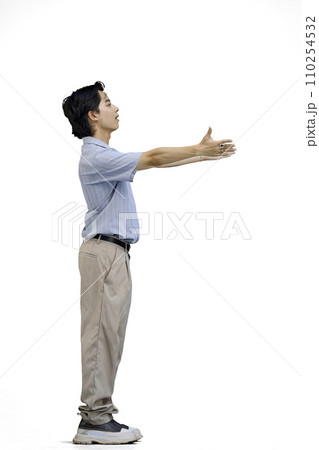 A guy in a blue shirt, on a white background, in full height, screams 110254532