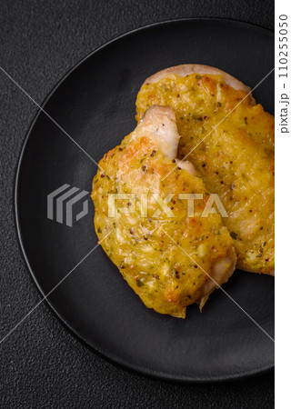 Delicious meat fried with Dijon mustard with salt, spices and herbs 110255050