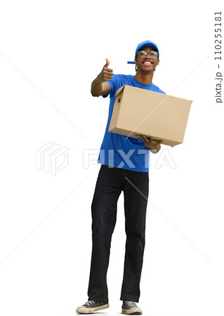 A male deliveryman, on a white background, full-length, with a box 110255181