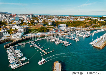 Ribadeo city and harbor with moored vessels. Northern Spain Ribadeo city and harbor with moored vessels. Northern Spain 110255728