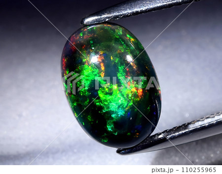 natural rainbow multicolor opal gem on the background natural rainbow multicolor opal gem on the background 110255965