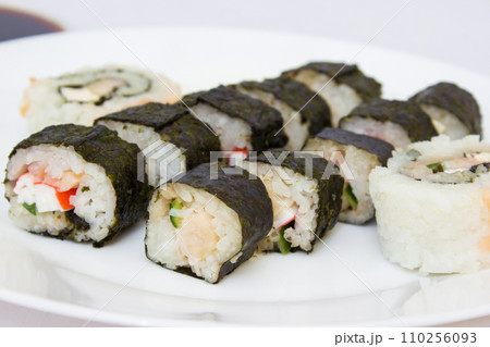 Japanese cuisine, rice sushi and fish - closeup 110256093