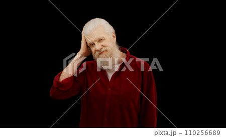 Stylish man in his 60s flirts and adjusts his hair, looking at the camera, embodying a handsome and charming grandpa Stylish man in his 60s flirts and adjusts his hair, looking at the camera, embodying a handsome and charming grandpa 110256689