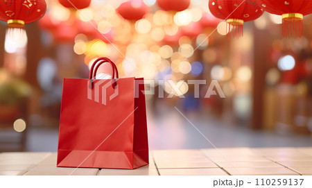 Mock up of a red paper shopping bag on blurry festive Chinese new year background, Chinese new year promotion, online shopping. Generative AI Mock up of a red paper shopping bag on blurry festive Chinese new year background, Chinese new year promotion, online shopping. Generative AI 110259137