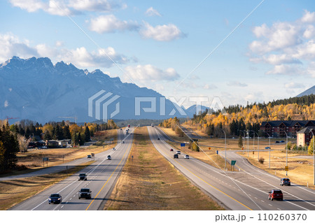 Canmore, AB, Canada - OCT 5 2023 : Trans-Canada Highway (Highway 1) exit 89 to Downtown Canmore in Canadian Rockies in autumn season. Transportation concept. 110260370