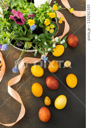 Blooming flowers and Easter eggs 110262105