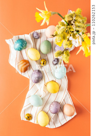 Naturally dyed Easter eggs on a napkin Naturally dyed Easter eggs on a napkin 110262153