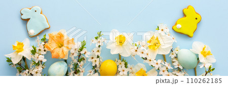 Spring flowers and Easter eggs and bunnies 110262185