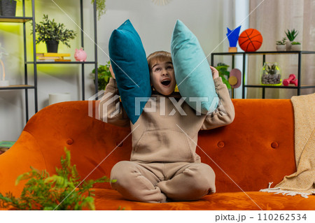 Neighbors repair work irritated boy by loud music at home cover ears with pillows annoyed by noise Neighbors repair work irritated boy by loud music at home cover ears with pillows annoyed by noise 110262534
