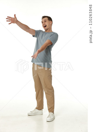 portrait of young smiling man on white background 110263848