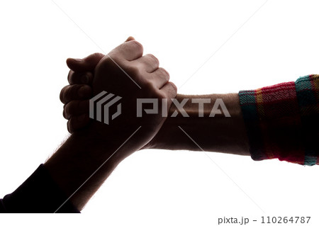The outstretched hands of young and elderly men, help - silhouette The outstretched hands of young and elderly men, help - silhouette 110264787