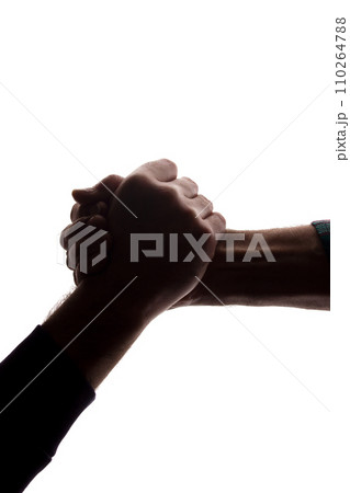 The outstretched hands of young and elderly men, help - silhouette The outstretched hands of young and elderly men, help - silhouette 110264788
