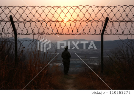 Border of South Kore and North Korea. Border with barbed wire on fence. 110265275