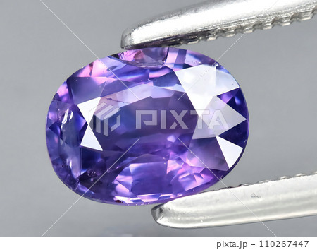natural purple sapphire gem on the background natural purple sapphire gem on the background 110267447