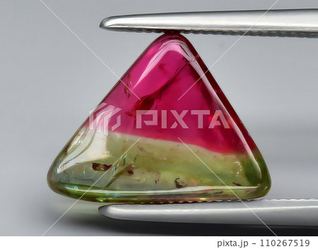 natural rough tourmaline gem on the background natural rough tourmaline gem on the background 110267519