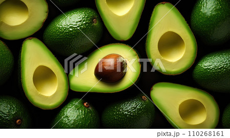 AI-generated content. Fresh avocado abstract background. Top view, whole and cut in half 110268161