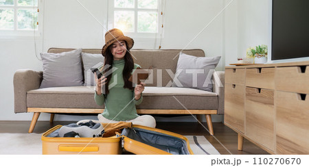 Woman packing a suitcase for a new travel trip. bag and luggage for journey 110270670