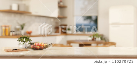 A copy space on a luxury white marble kitchen tabletop in a modern white kitchen. close-up image 110270725