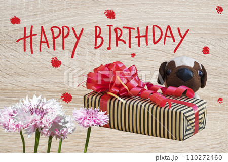 happy birthday message card with gift box, dog toy with flowers happy birthday message card with gift box, dog toy with flowers 110272460