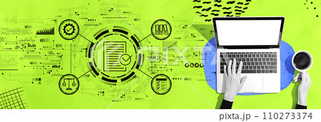 Compliance theme with person using a laptop 110273374