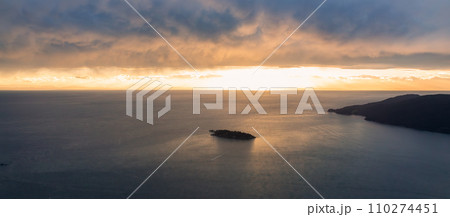 Islands in Howe Sound, West Coast of Pacific Ocean. Dramatic Sunset Sky. Aerial Islands in Howe Sound, West Coast of Pacific Ocean. Dramatic Sunset Sky. Aerial 110274451