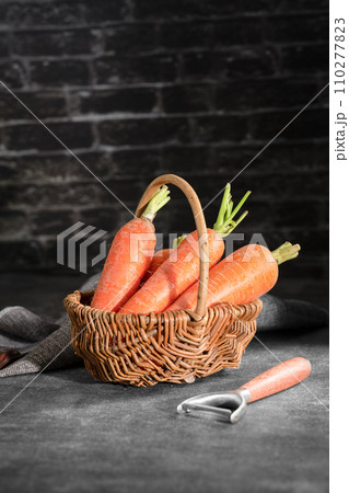 fresh carrots on black background 110277823