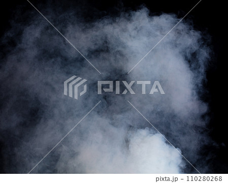 Dense Fluffy Puffs of White Smoke and Fog on black Background, Abstract Smoke Clouds, Movement Blurred out of focus. Smoking blows from machine dry ice fly fluttering in Air, effect texture 110280268