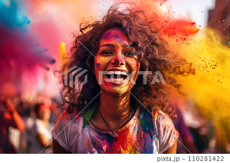 Portrait of young woman in colorful powder on indian street, Holi festival 110281422