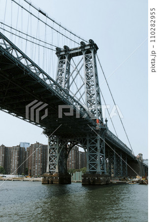 East River and Williamsburg Bridge, New York City 110282955
