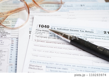 Tax form 1040 U.S. Individual Income Tax Return, business finance concept. Tax form 1040 U.S. Individual Income Tax Return, business finance concept. 110283974