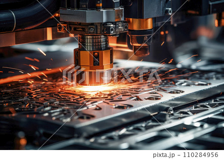 Sparks fly out machine head for metal processing laser metal on metallurgical plant 110284956