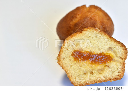 Cupcake with filling on a white background. Cupcake with filling on a white background. 110286074