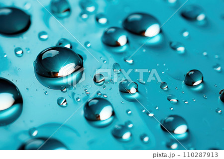 Water drops close-up on a blue background Water drops close-up on a blue background 110287913