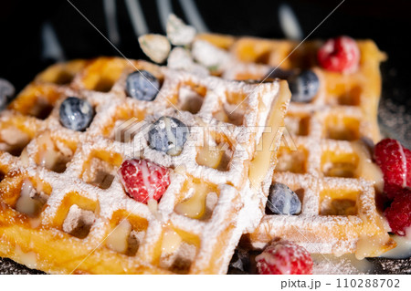 Belgian Liege waffles with berries, blueberries athens raspberries blueberries Belgian Liege waffles with berries, blueberries athens raspberries blueberries 110288702