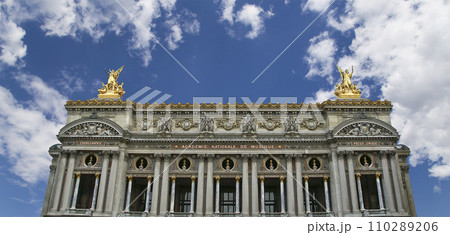 Opera Garnier (Garnier Palace) against the background of a beautiful sky with clouds, Paris, France. Translation Opera Garnier (Garnier Palace) against the background of a beautiful sky with clouds, Paris, France. Translation 110289206