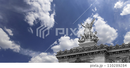Golden statue of Liberty on the roof of the Opera Garnier (Garnier Palace) against the sky with clouds. Sculpted by Charles Gumery in 1869. Paris, France. UNESCO World Heritage Site Golden statue of Liberty on the roof of the Opera Garnier (Garnier Palace) against the sky with clouds. Sculpted by Charles Gumery in 1869. Paris, France. UNESCO World Heritage Site 110289284