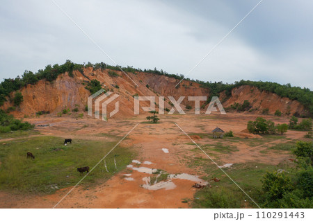 Aerial top view of ground in the land with sand in factory industry for construction site. Arid pattern texture background. Bulldozer tractor 110291443
