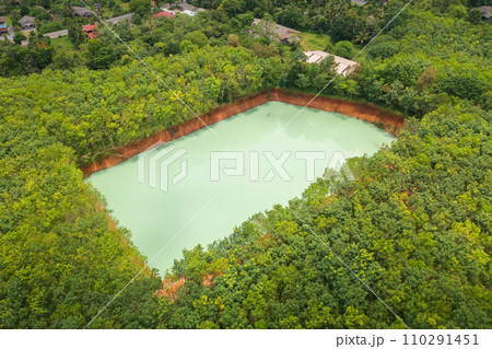 Aerial top view of ground in the land with sand in factory industry for construction site. Arid pattern texture background. Bulldozer tractor Aerial top view of ground in the land with sand in factory industry for construction site. Arid pattern texture background. Bulldozer tractor 110291451