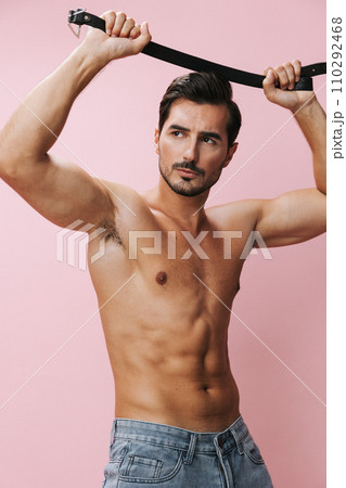 Body man muscle muscular belt jeans pink sport background torso naked fitness lifestyle sexy 110292468