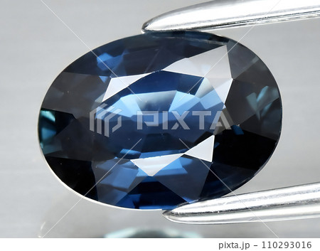 natural blue sapphire gem on the background 110293016