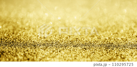 Abstract gold glitter sparkle with bokeh background Abstract gold glitter sparkle with bokeh background 110295725