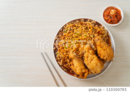 Korean instant noodles with fried chicken or Fried chicken ramyeon Korean instant noodles with fried chicken or Fried chicken ramyeon 110300765