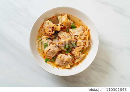 pork wonton soup or pork dumplings soup with roasted chili pork wonton soup or pork dumplings soup with roasted chili 110301048