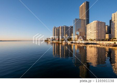 City of Miami, Florida skyline reflected in Biscayne Bay at sunrise. 110301138