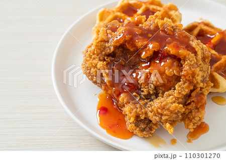 fried chicken with waffle and spicy sauce 110301270