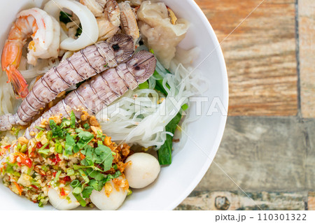 spicy seafood noodles bowl in Thai style 110301322